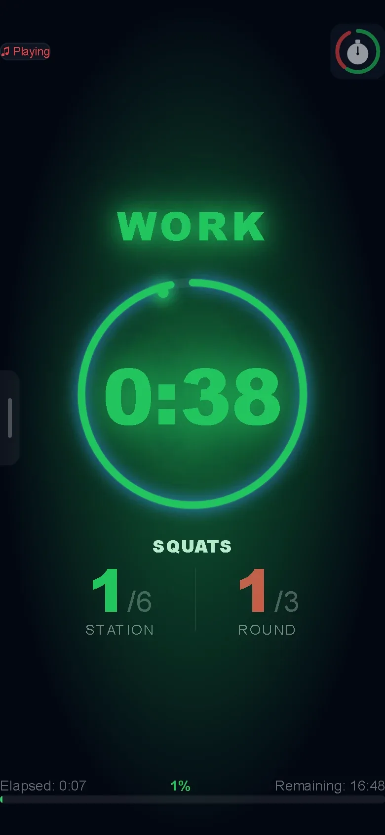 The timer on a phone in the WORK phase with 0:38 left, the exercise Squats, station 1 of 6 and round 1 of 3